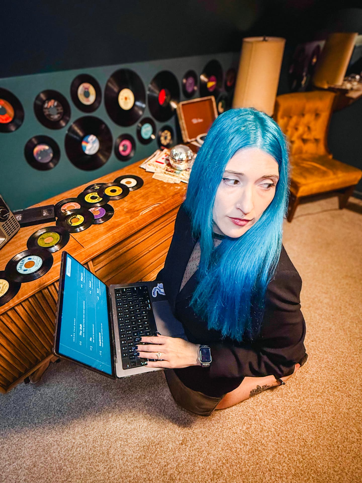 Amanda O’Green working on her laptop in the records room
